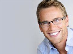 young man smiling with dental implants in Torrance