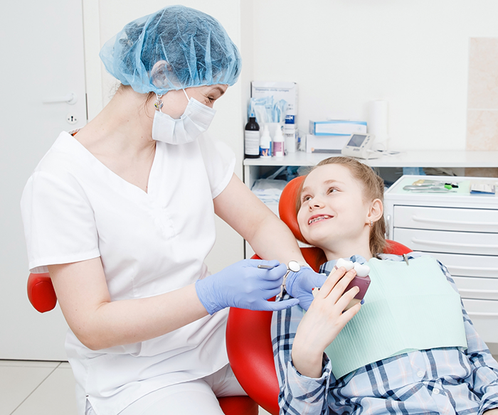 Teenage girl in the dental chair at a dental office in Torrance