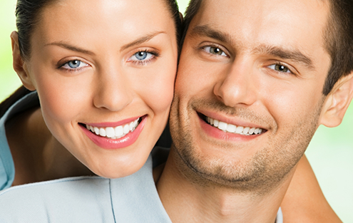 Close up of man and woman smiling together