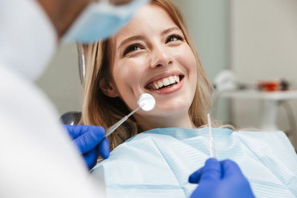 woman smiling at dentist