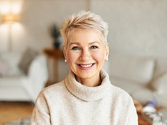  Woman smiling with dental bridge