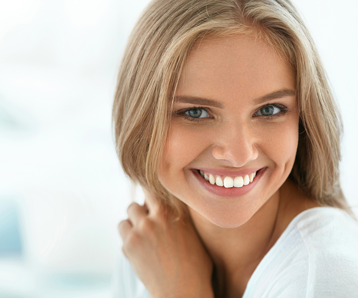 Blonde woman smiling with flawless teeth after cosmetic dentistry in Torrance