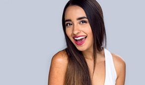 Woman with long dark hair smiling