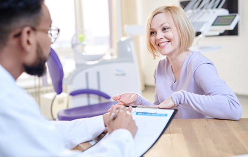 Woman at a cosmetic dentistry consultation