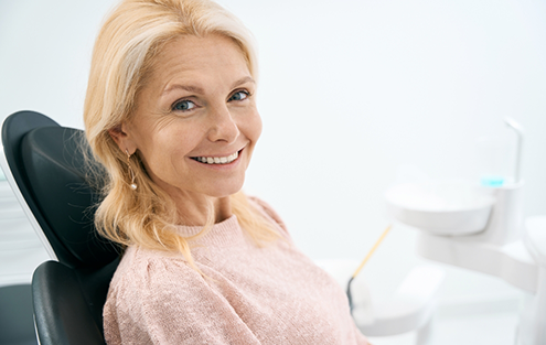 Woman smiling in dental chair