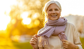 Senior woman with a scarf outdoors