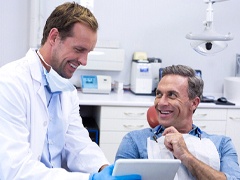 Man learning dental implant technology in Torrance