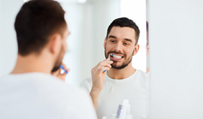 Man brushing his teeth