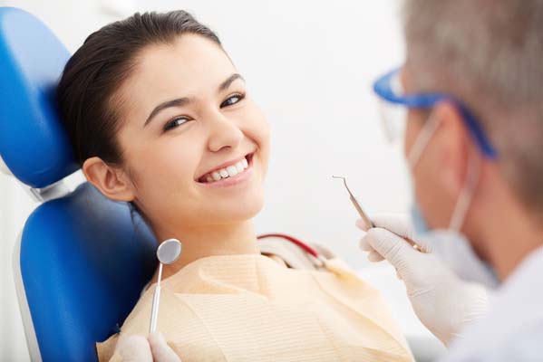 woman smiling in dental chair