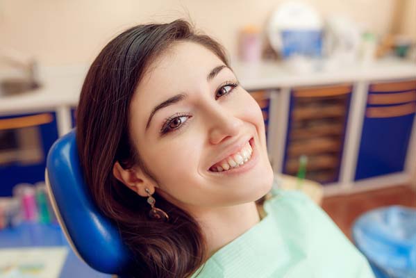 woman smiling in dental chair