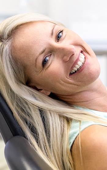 Smiling woman in dental chair