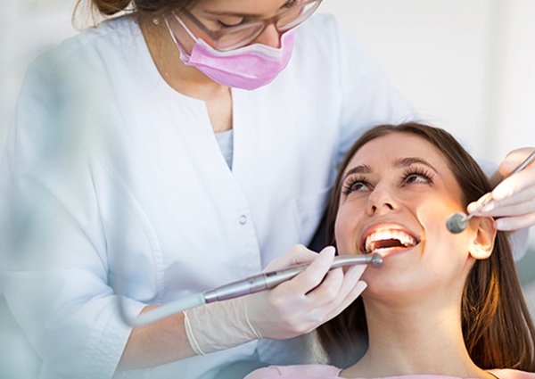 Woman smiling in dental chair