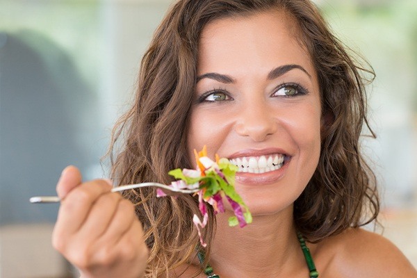 Woman eating a salad