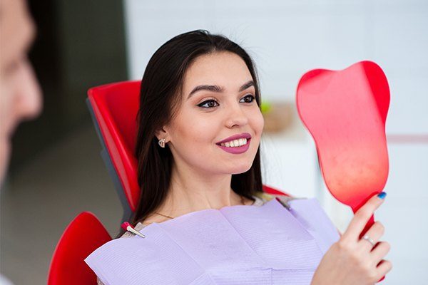 woman smiling in dental chair