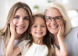 Three generations of family smiling