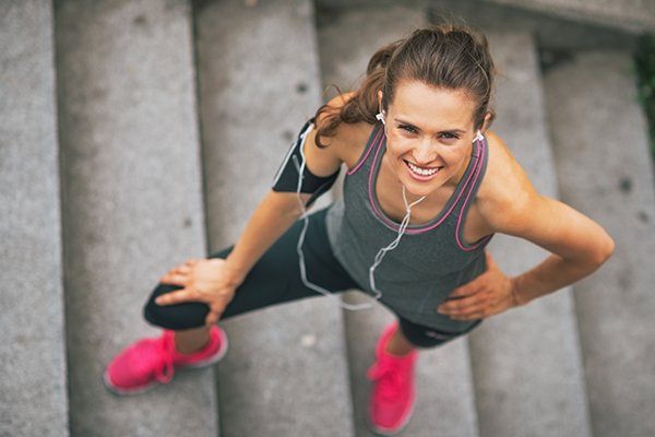 Woman smiling in exercise attire