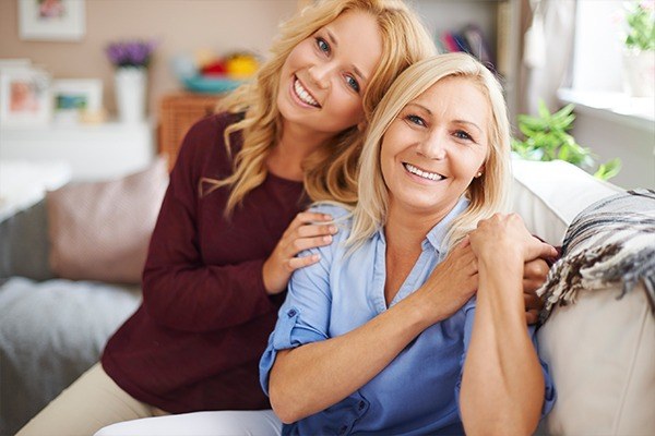 women smiling together