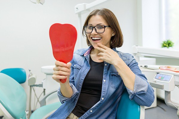 Woman smiling in mirror