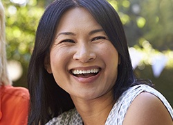 Woman smiling outdoors