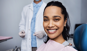 Woman grinning in dental chair