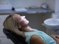 Woman relaxing with dental IV sedation in Torrance 