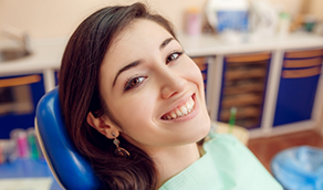 Woman smiling in dental chair