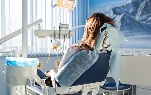 Patient waiting in dental chair
