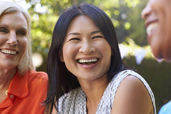 Woman smiling outside