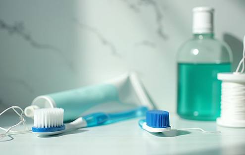 Oral hygiene instruments on bathroom counter