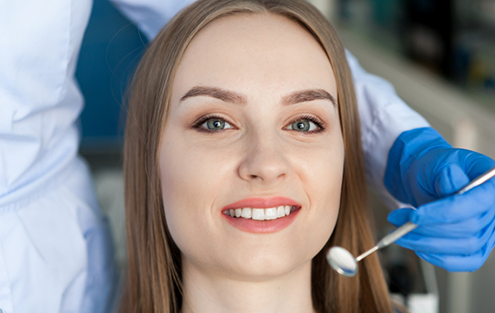 Woman sitting in dental chair