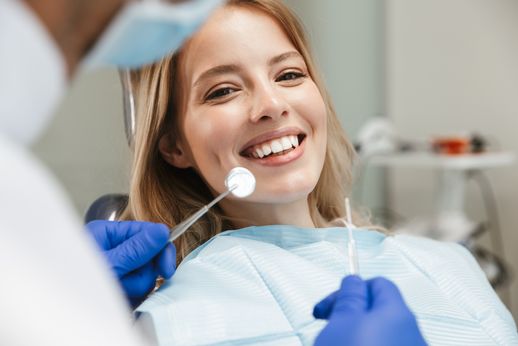 woman smiling during dental checkup