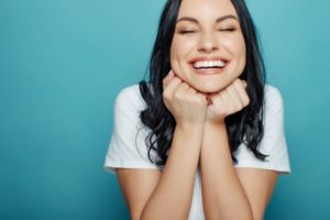 patient smiling after their full mouth reconstruction in Torrance