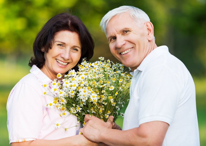 happy older couple with dentures