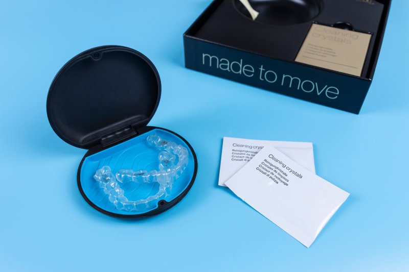 Invisalign cleaning crystal packets on table 