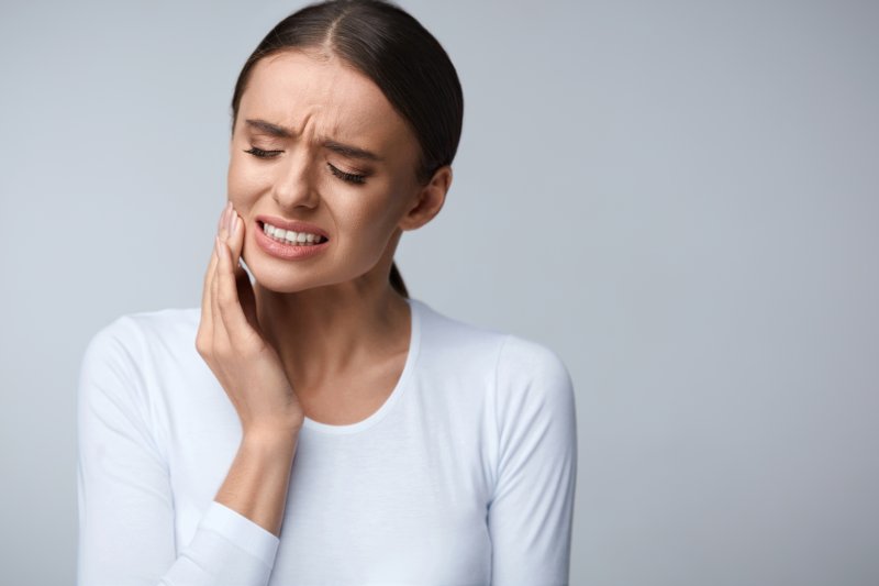 A woman facing tooth pain 