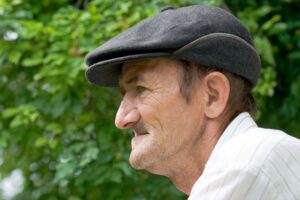 Portrait of elderly man with no teeth